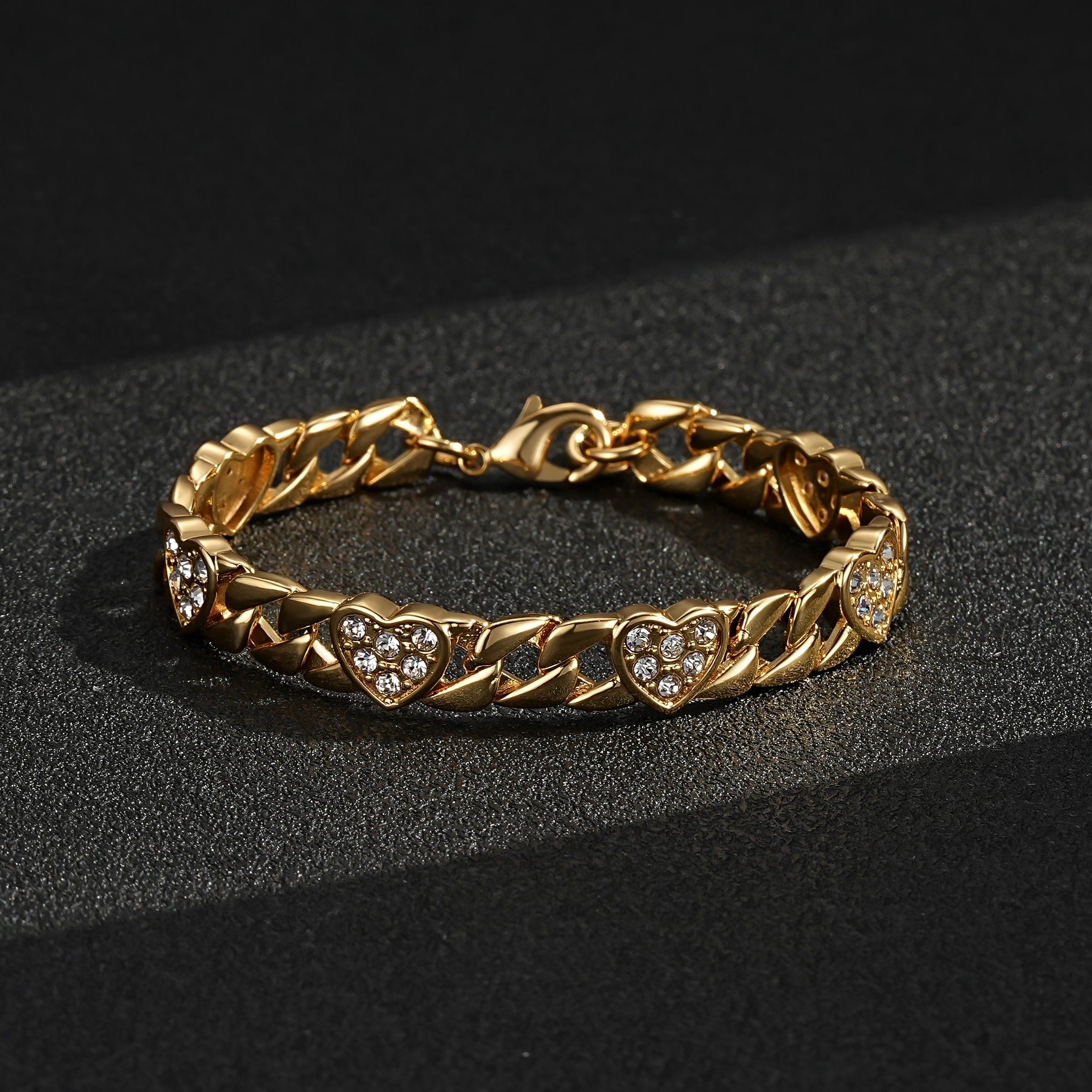 Kids gold heart curb bracelet, 6 inches long, 7mm wide, 11 grams.