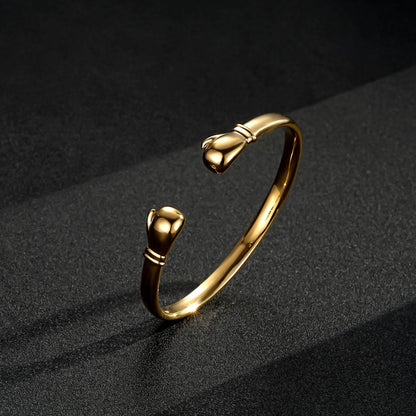 Lightweight gold-filled boxing glove bangle, 4mm wide, 7.5-8 inch length.