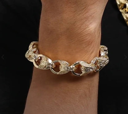 Big gold tulip bracelet, 15mm wide, 8-8.5 inches long, 106 grams.