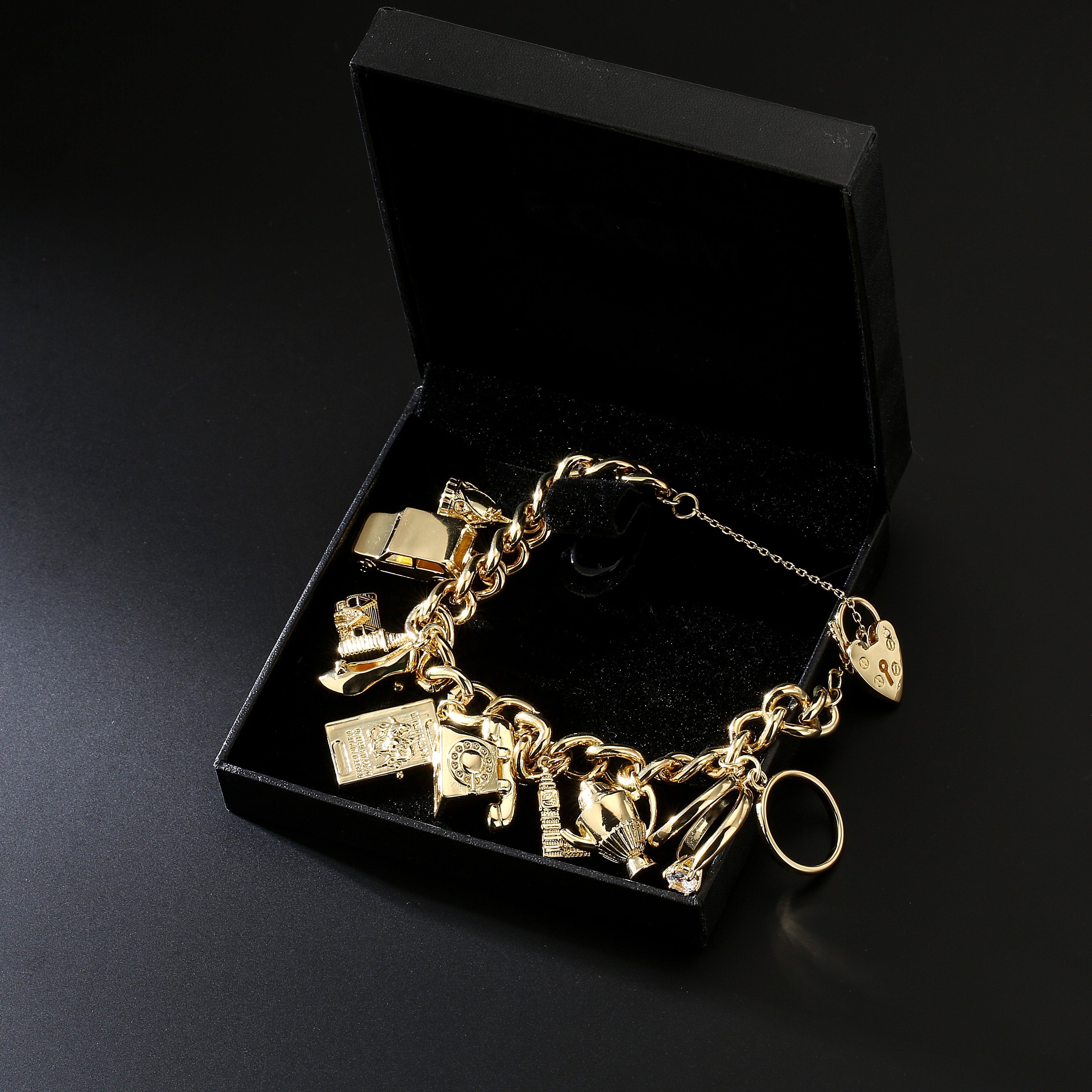 Dolce and gabbana discount gold charm bracelet